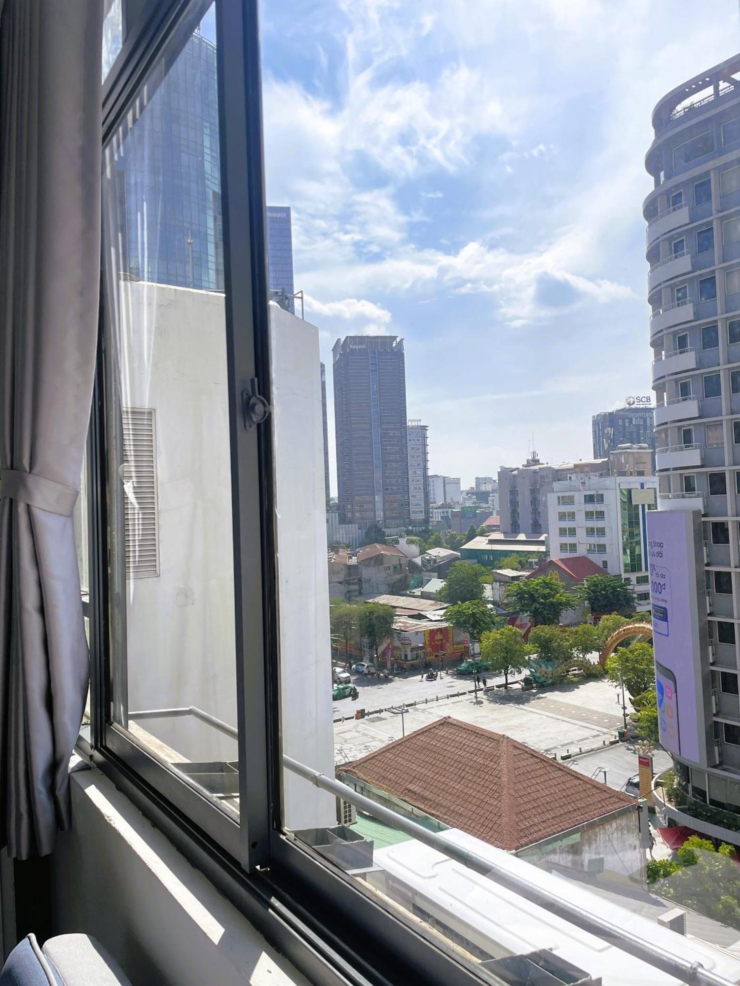 6Even Hotel - Have A Staycation In The Cafe Apartments Building Хошимин Екстериор снимка