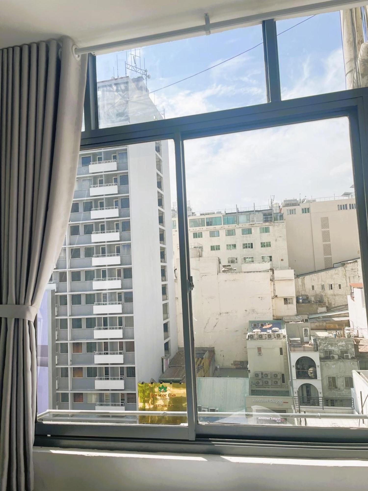 6Even Hotel - Have A Staycation In The Cafe Apartments Building Хошимин Екстериор снимка