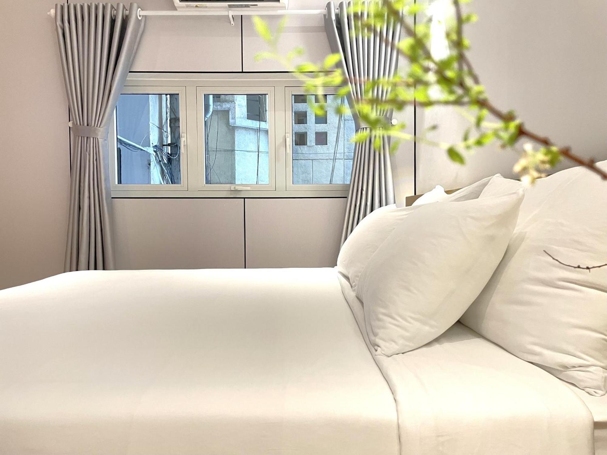 6Even Hotel - Have A Staycation In The Cafe Apartments Building Хошимин Екстериор снимка